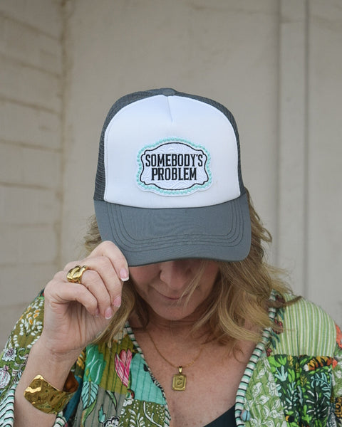 SOMEBODY'S PROBLEM TRUCKER HAT - DRK GREY/WHITE - Salty Lime Boutique