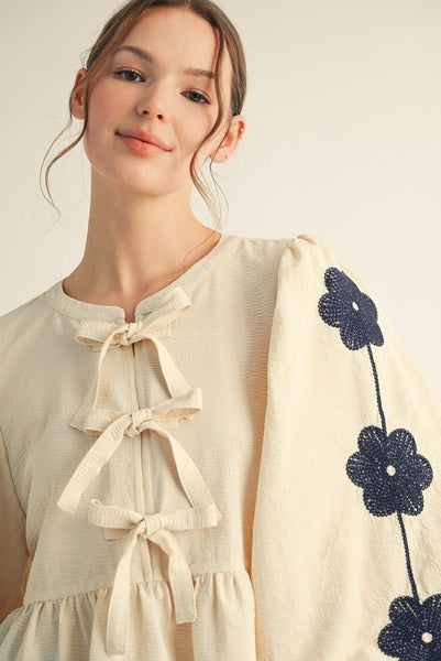 FRONT BOW TIE EMBROIDERED PEPLUM TOP - Salty Lime Boutique