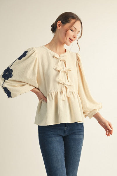 FRONT BOW TIE EMBROIDERED PEPLUM TOP - Salty Lime Boutique