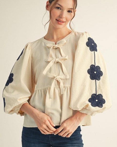 FRONT BOW TIE EMBROIDERED PEPLUM TOP - Salty Lime Boutique