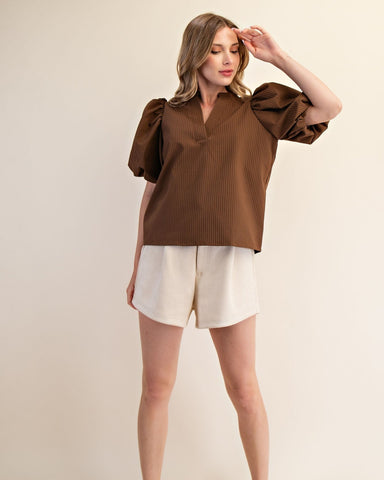  brown v-neck blouse with puffy sleeves