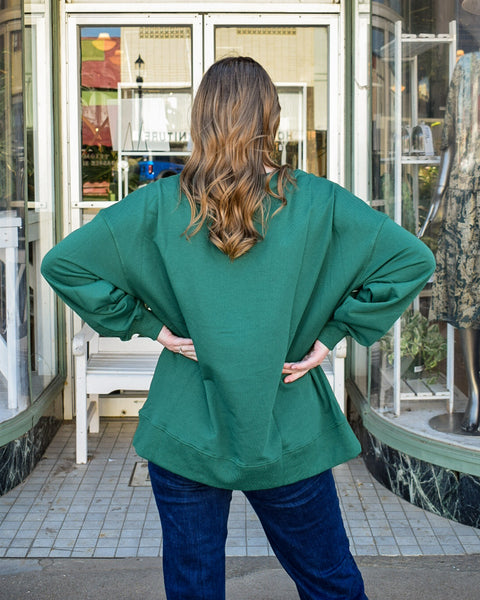 UNDER THE MISTLETOE SWEATSHIRT - HUNTER GREEN