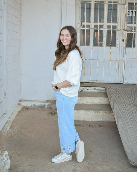 EMBROIDERED HEM WASHED STRETCH DENIM PANTS -  LT DENIM