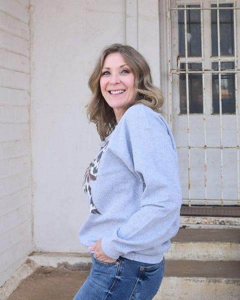 BIG ON BOWS COW PRINT SWEATSHIRT - REG/CURVY - Salty Lime Boutique