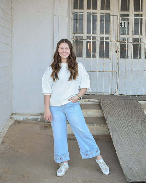 EMBROIDERED HEM WASHED STRETCH DENIM PANTS -  LT DENIM