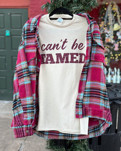 CAN'T BE TAMED GRAPHIC TEE