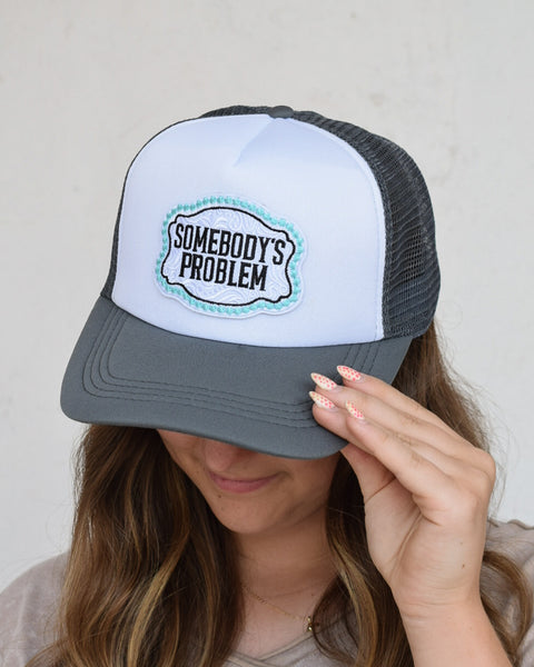 SOMEBODY'S PROBLEM TRUCKER HAT - DRK GREY/WHITE - Salty Lime Boutique