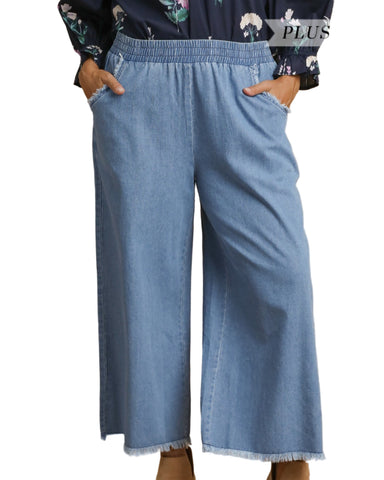 WASHED DENIM PANTS WITH FRAYED HEM BY UMGEE - CURVY