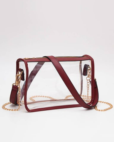 Clear crossbody bag with a burgundy strap and gold chain, concert bag, stadium bag