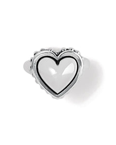 Silver heart-shaped ring on a white background