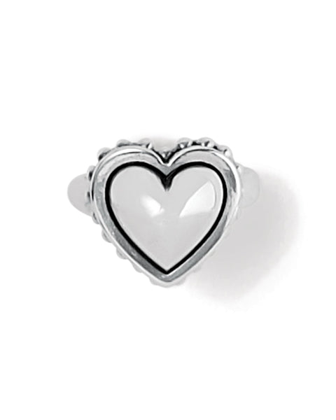 Silver heart-shaped ring on a white background