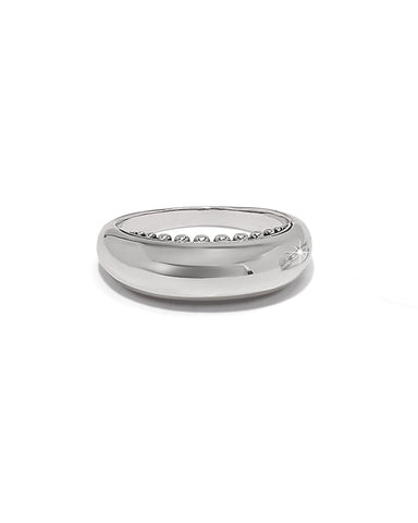 Silver ring with small diamonds on a white background