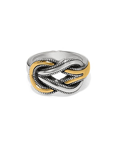 Two-tone ring with gold and silver design on a white background