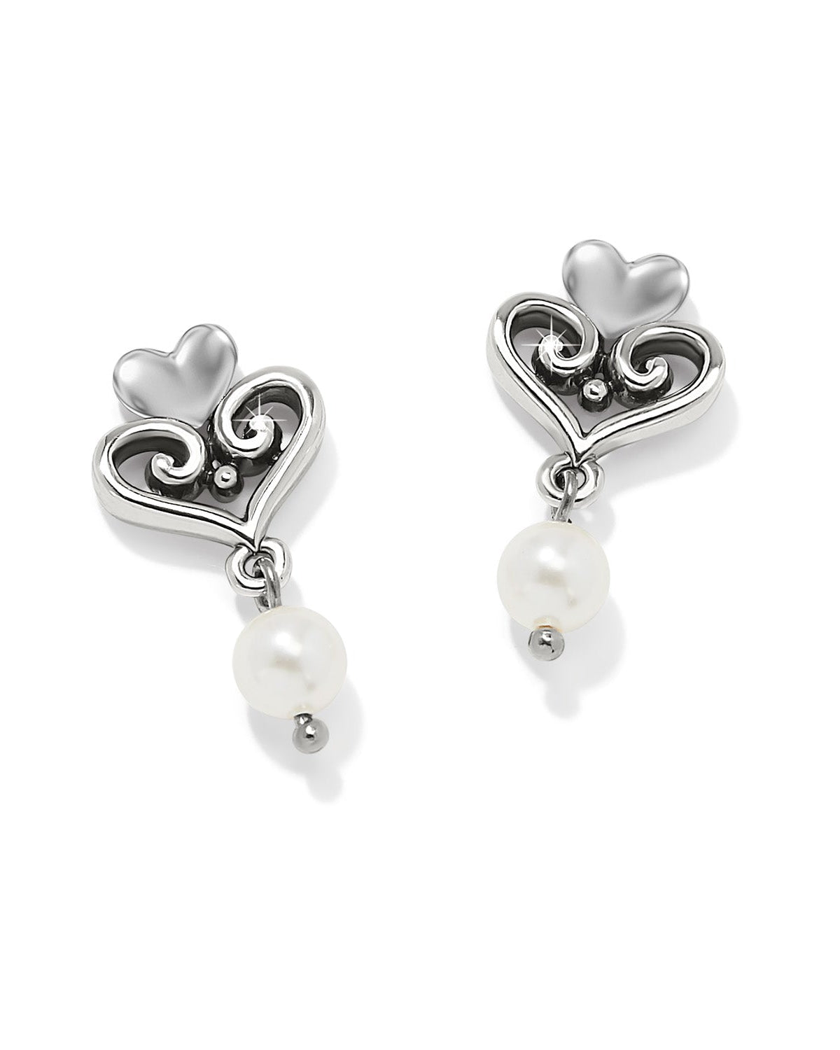 Heart-shaped earrings with pearl drops on a white background