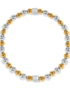 Bracelet with alternating gold and silver beads on a white background