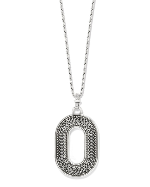 Silver necklace with a decorative pendant on a white background